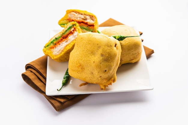 Ulta vada pav is made with a spicy potato stuffed bun called\
pav inside vada inside out wada pao