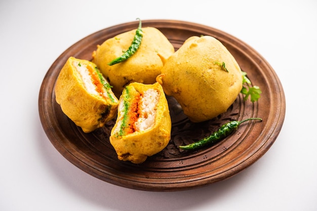 Ulta Vada Pav is made with a spicy potato stuffed bun called pav inside vada inside out wada pao