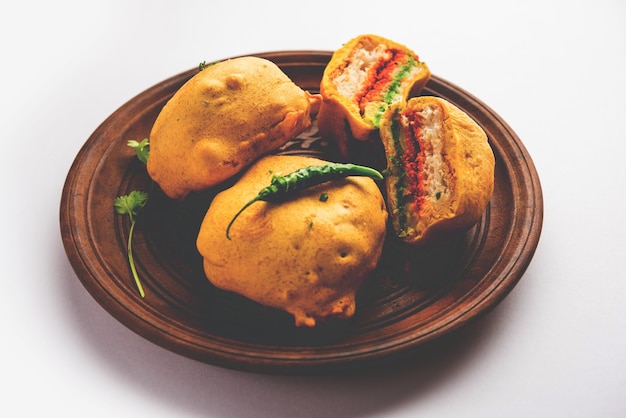 Ulta Vada Pav is made with a spicy potato stuffed bun called pav inside vada inside out wada pao