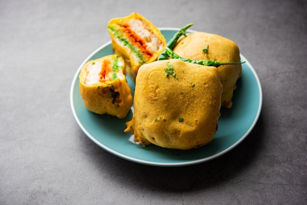 Ulta vada pav is made with a spicy potato stuffed bun called\
pav inside vada inside out wada pao