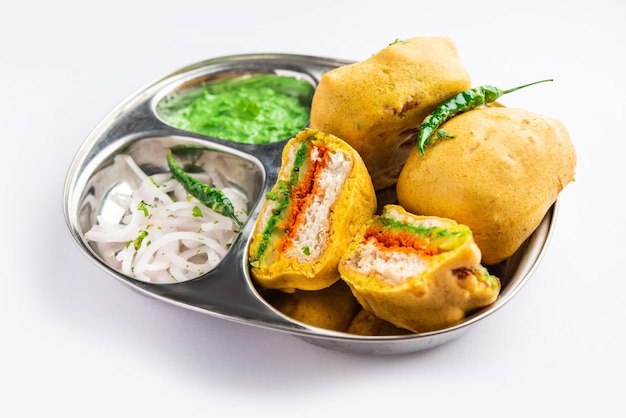 Ulta Vada Pav is made with a spicy potato stuffed bun called pav inside vada inside out wada pao