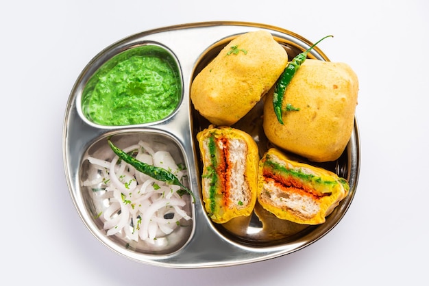 Ulta Vada Pav is made with a spicy potato stuffed bun called pav inside vada inside out wada pao