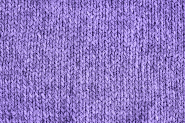 Ultra violet knitted texture. Handmade Knitwear. 