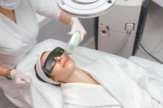 ultraformer lifting face skin care closeup of woman getting facial hydro microdermabrasion peeling