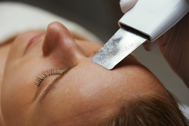 Ultrasonic cleaning of the skin Closeup photo macro