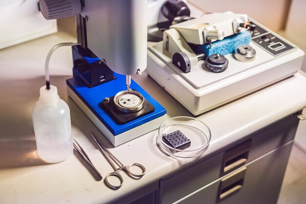 Ultrasonic Cutter System and precision micrometer grinder polishing machine used to prepare samples for electronic microscopy investigation