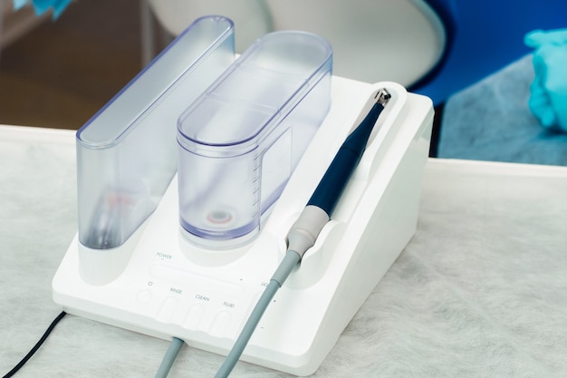 Ultrasonic scaler in the dental office. Dentistry Concept