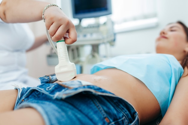 Ultrasound scanner in the hands of a doctor