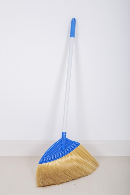 Umbrella against white wall at home