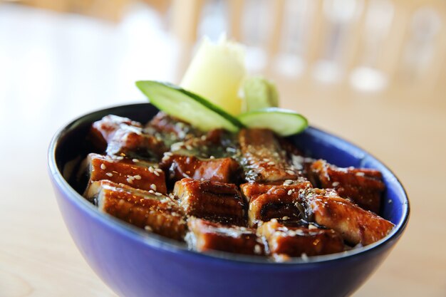 Unagi don on wood background , Japanese food