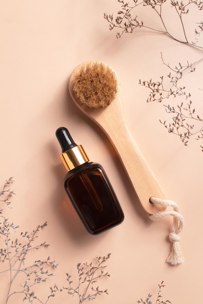 Unbranded serum bottle and anticellulite brush for dry body massage Organic scin care Prevent cellulite and body problem