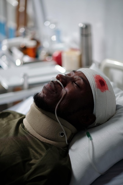 Unconscious Military Man on Hospital Ward