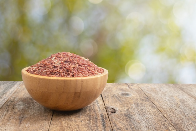 Uncook brown rice on table