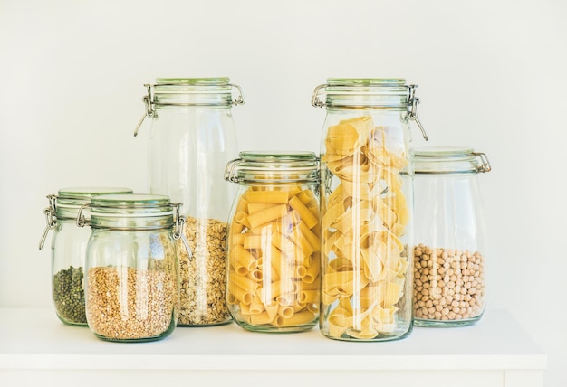 Photo uncooked cereals grains beans and pasta for healthy cooking