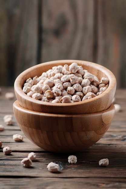 Uncooked chickpea on the vintage table