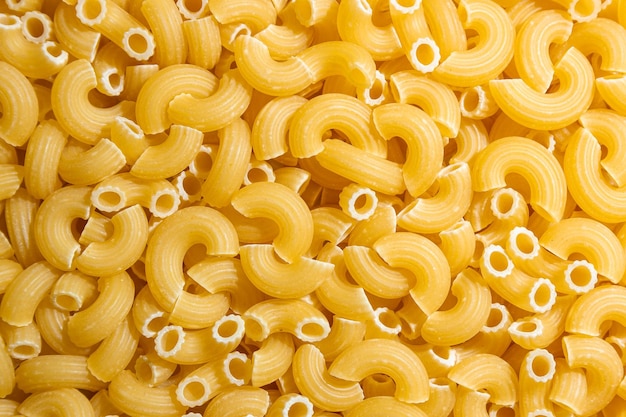 uncooked chifferi rigati pasta background