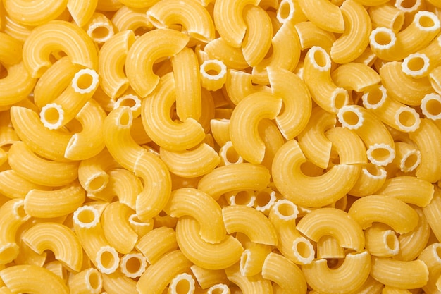 uncooked chifferi rigati pasta background