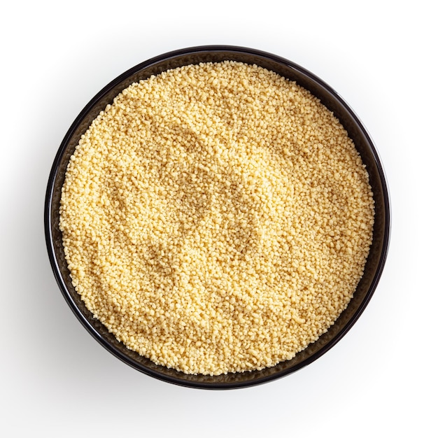 Uncooked couscous in black bowl isolated on white background with clipping path