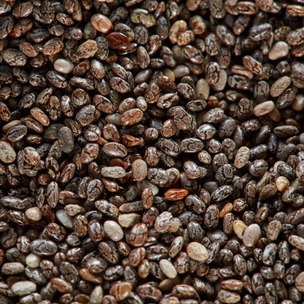 Uncooked linen seeds as a background. Close up, top view, high resolution product. Healthy superfood Concept. Top view.