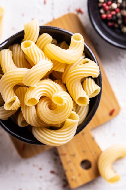 Uncooked pasta in a bowl