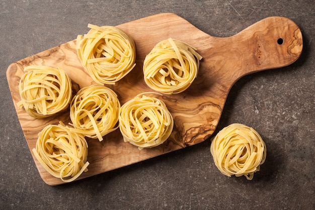 Uncooked pasta on kitchen table