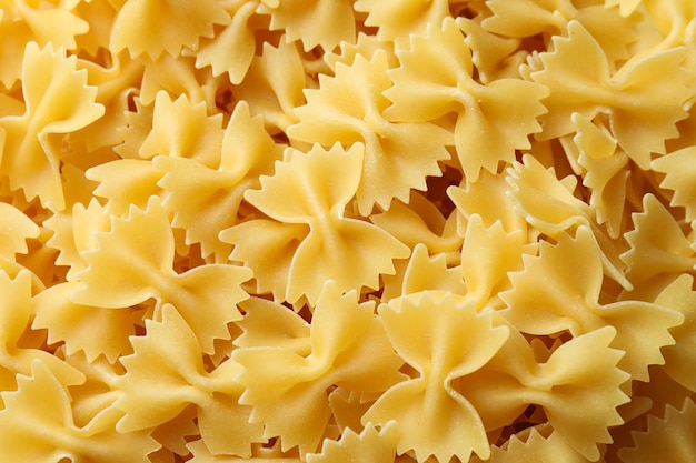 Uncooked pasta on whole, close up