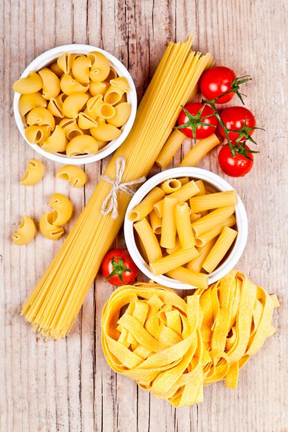 Uncooked pasta with tomatoes