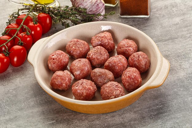 Uncooked raw beef meatball minced