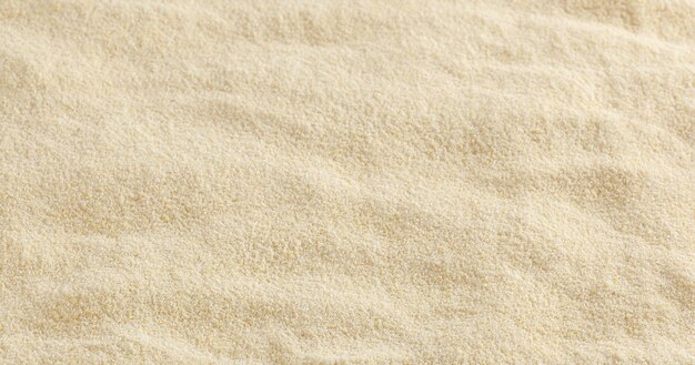 Uncooked semolina flour background