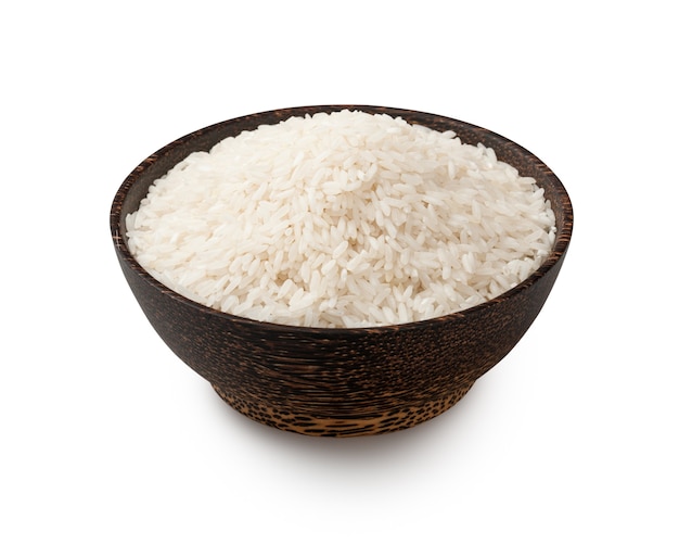 Uncooked white long grain rice in a bowl, isolated on white