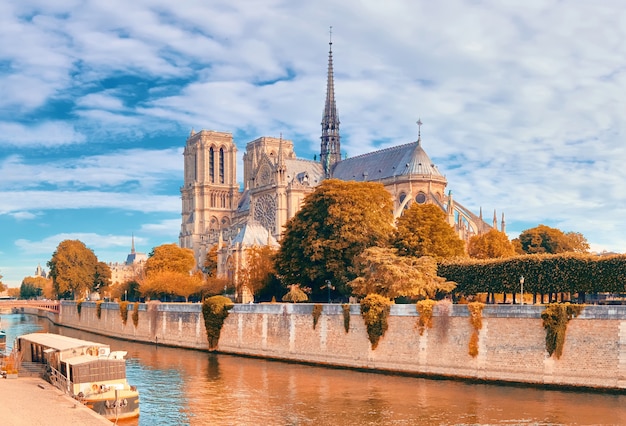 Undamaged east facade of Notre Dame de Paris in autumn colors before the fire