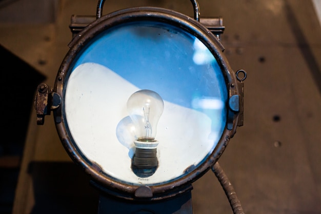 Undercarriage floodlight with incandescent lamp of a vintage steam locomotive