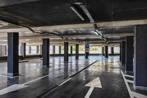 Photo underground parking located under the residential building. storage place for personal transport for city residents.