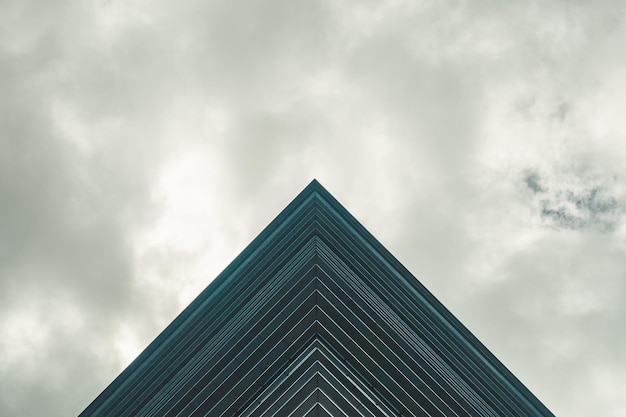 Underside panoramic and perspective view to steel blue glass high rise building skyscrapers business concept of successful industrial architecture