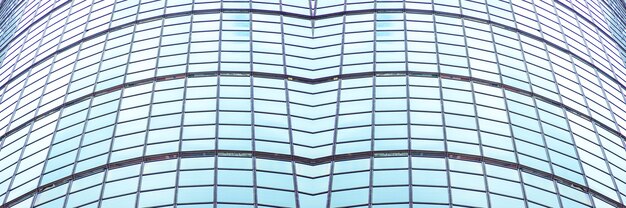 Underside panoramic and perspective view to steel blue glass high rise building skyscrapers, business concept of successful industrial architecture