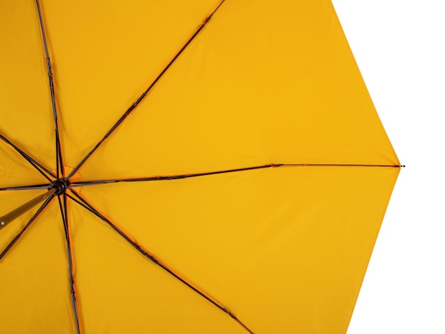 Photo underside of yellow umbrella with eight ribs isolated on white background bottom view
