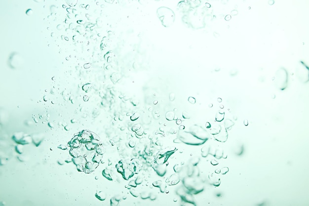 Underwater texture air bubbles diving / view from under the\
water up, underwater background