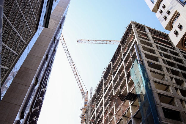 Unfinished construction building at urban city