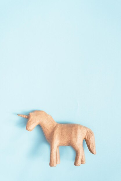 unfinished paper mache unicorn for kids art and craft project.