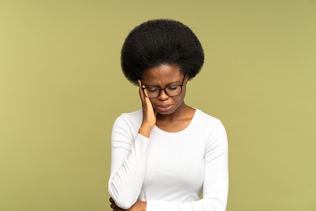 Unhappy black woman cry hiding face with hand tired stressed female disappointed and depressed