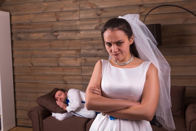 Unhappy bride, sleeping on wooden room