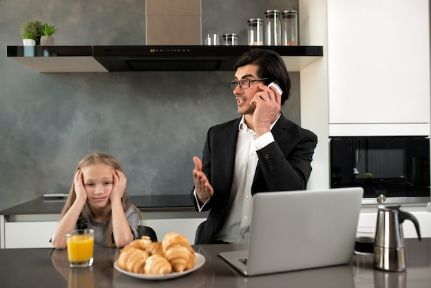 Unhappy daughter annoyed due to father work at the home