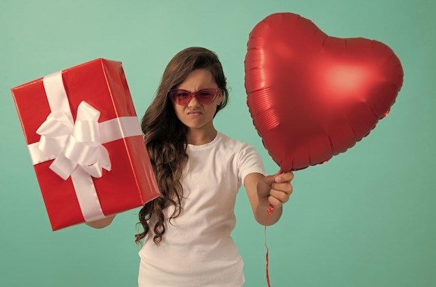 Unhappy kid hold present child prepare for party holiday valentine day shopping final sell out