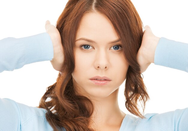 unhappy woman holding her head with hands