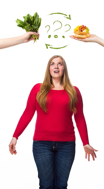 unhealthy and healthy food. the oncept of dieting and healthy lifestyle for fat woman