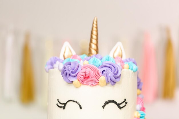 Unicorn cake decorated with multicolor buttercream icing.