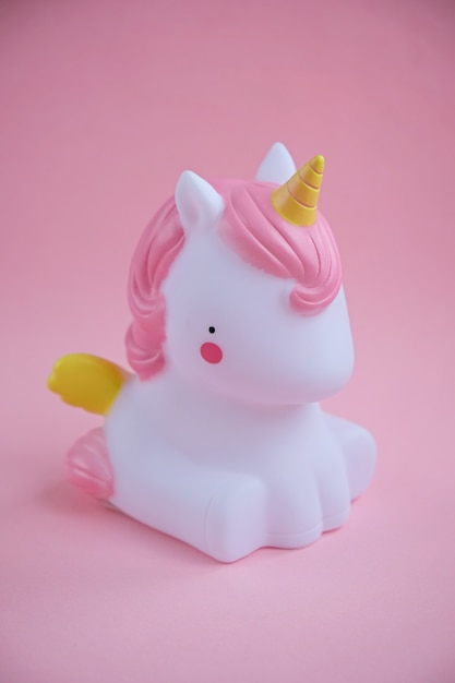 Unicorn light home decor on pink background