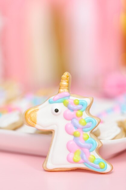 Unicorn sugar cookies decorated with royal icing at the kids birthday party.