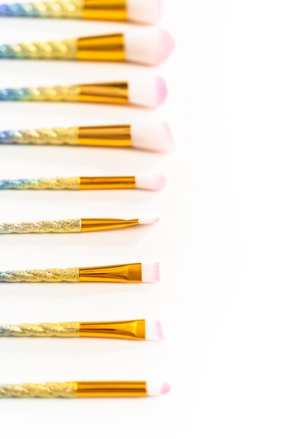 Unicorn-themed makeup brush set on a white background.