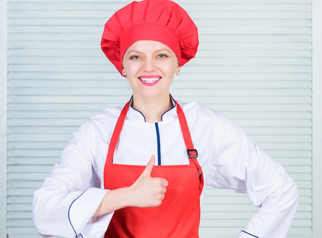 Uniform for professional chef Lady adorable chef teach culinary arts Best culinary recipes to try at home Improve culinary skill Welcome to my culinary show Woman pretty chef wear hat and apron